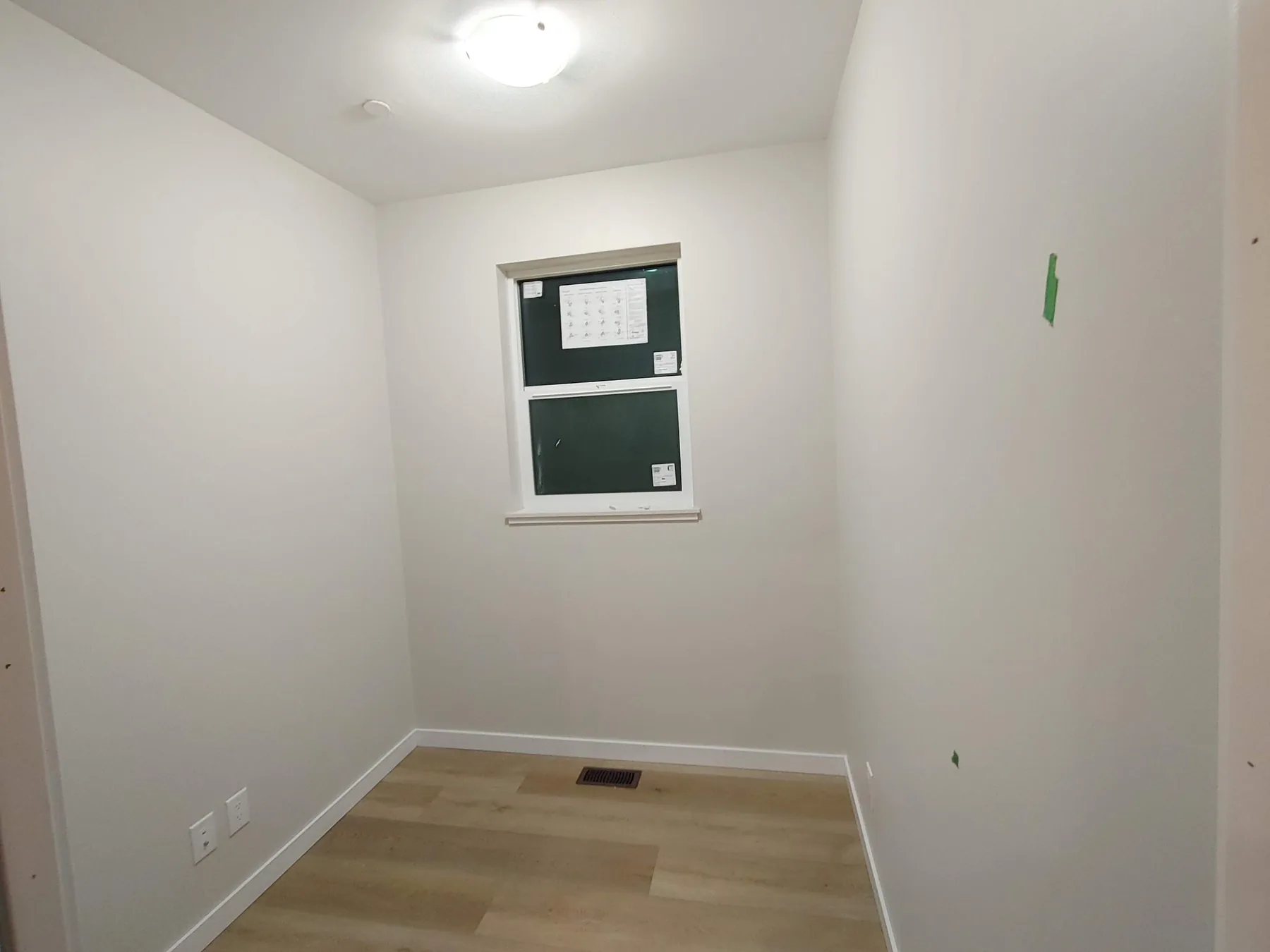 Flush ceiling fixture installed in a finished bedroom