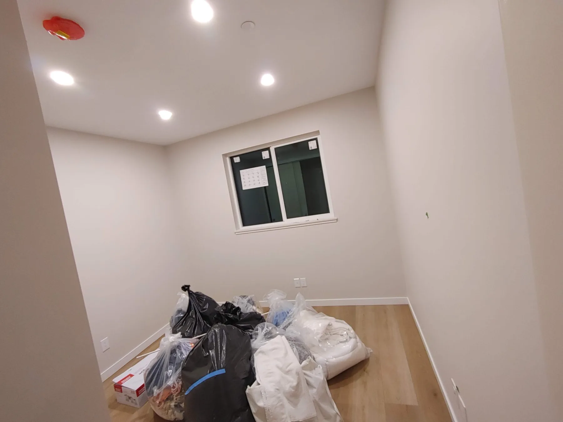 Recessed fixtures installed in a high-ceiling residential room