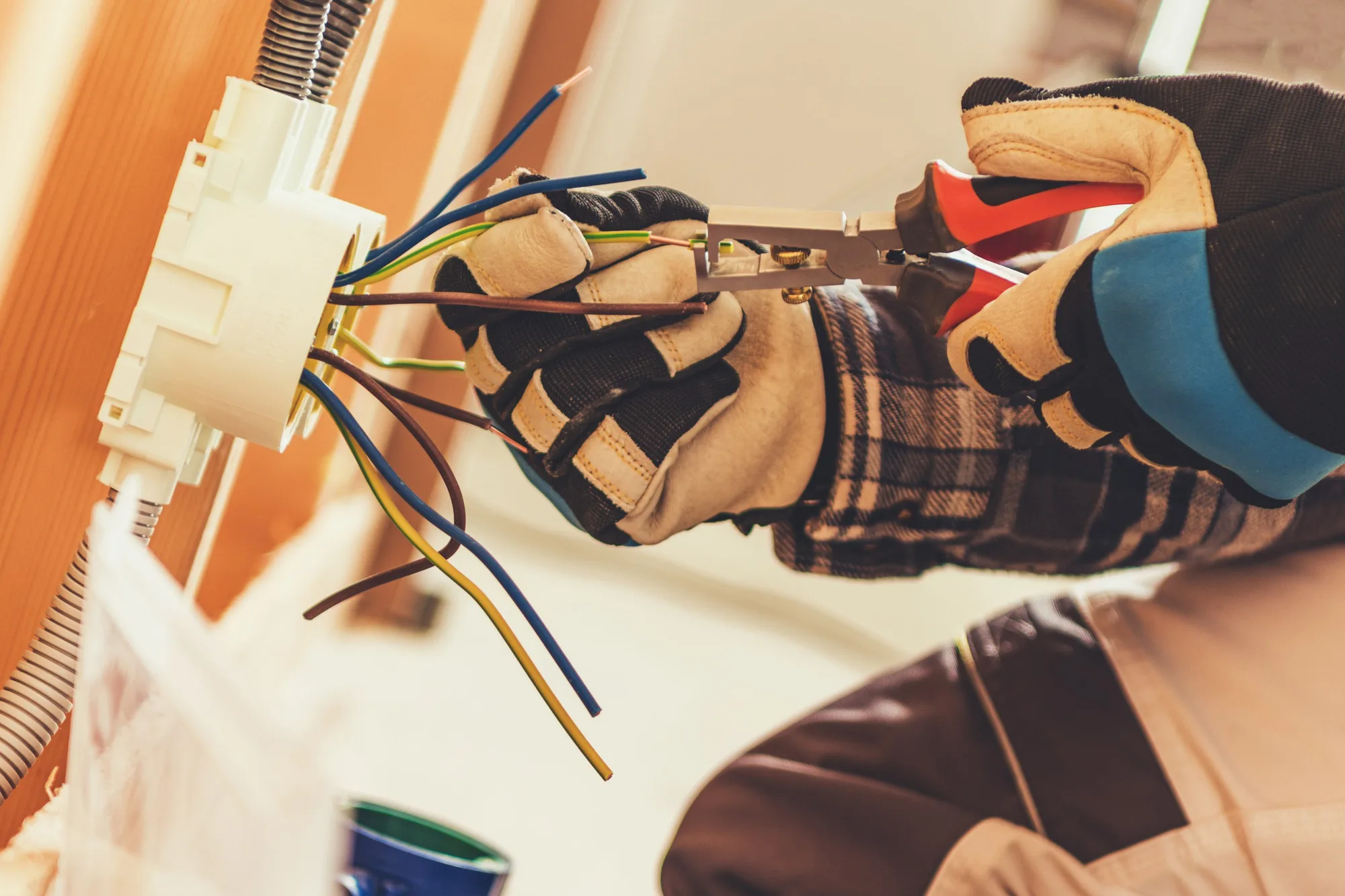 Residential electrician working in a Vancouver home