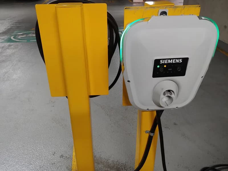 Multiple EV charging stations installed in a commercial parkade