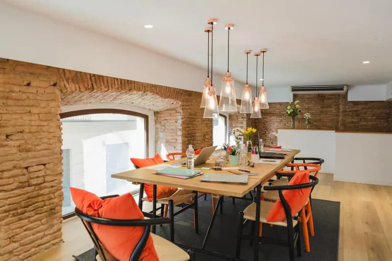Warm pendant and recessed lighting in a finished residential interior